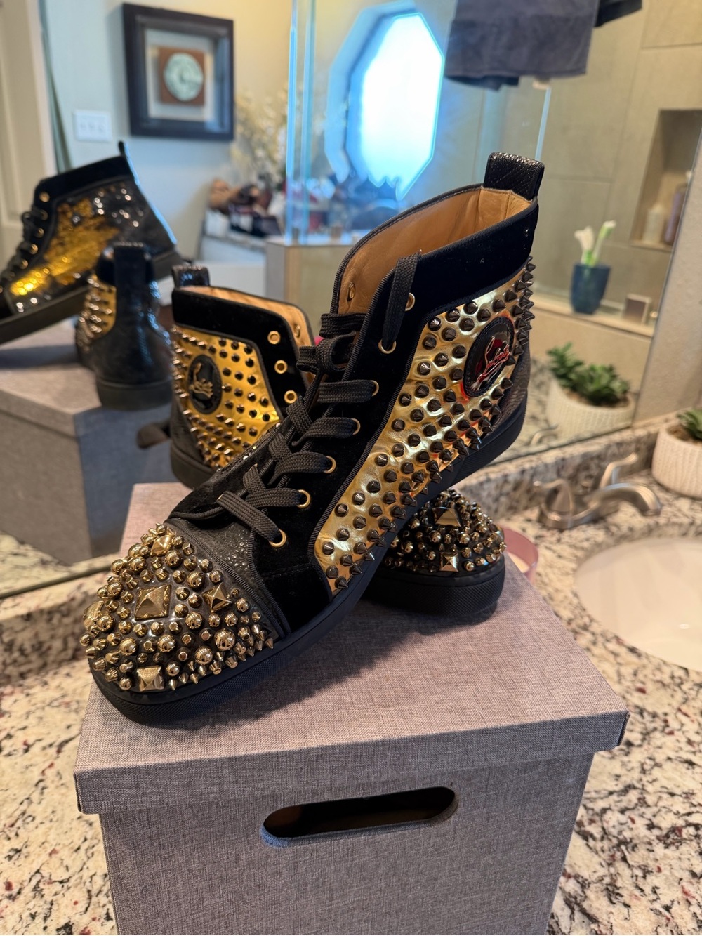Christian Louboutin Black and Gold Studded High-Top Sneakers
